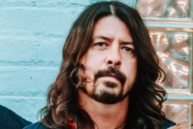 DAVE GROHL Almost Falls From Stage Again During FOO FIGHTERS Show