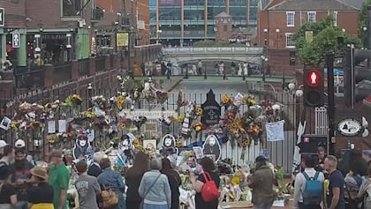 Watch: Fans Turn Birmingham’s BLACK SABBATH Bench Into Makeshift Memorial For OZZY OSBOURNE