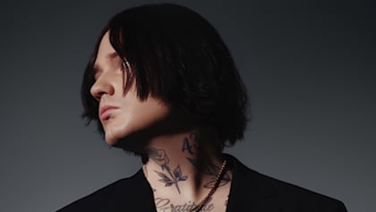 Ex-ASKING ALEXANDRIA Singer DENIS 'STOFF' SHAFOROSTOV Returns With New DRAG ME OUT Single 'Can't Keep On Running Away'